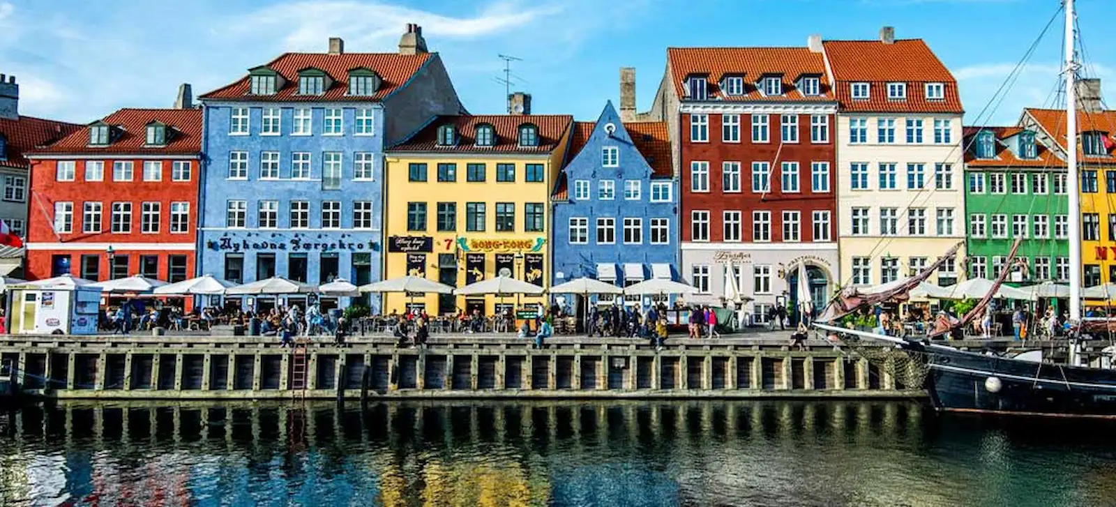 Brightly colored waterfront houses at Nyhavn in Copenhagen